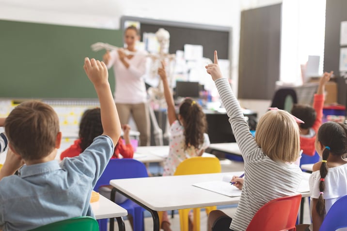 classroom-kids-raising-hands